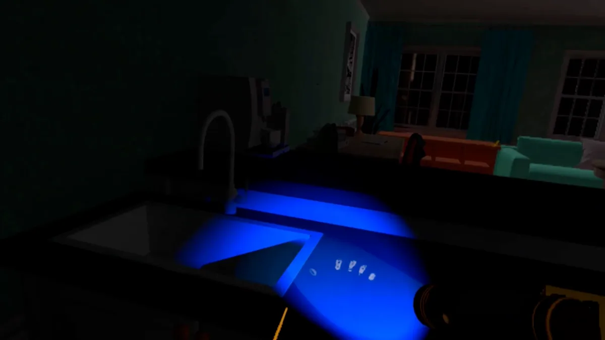 Une trace de main révélée à la lumière bleue, dans la maison en réalité virtuelle